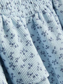 7-15 años | Blusa y falda de volantes