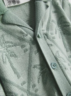 1,5-8 años | Camisa y pantalones cortos con palmeras