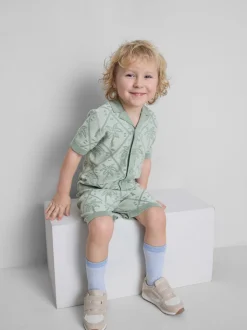 1,5-8 años | Camisa y pantalones cortos con palmeras