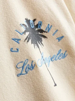 7-15 años | Camiseta texturizada con palmeras