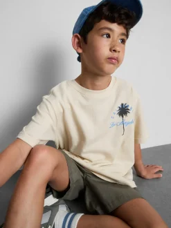 7-15 años | Camiseta texturizada con palmeras