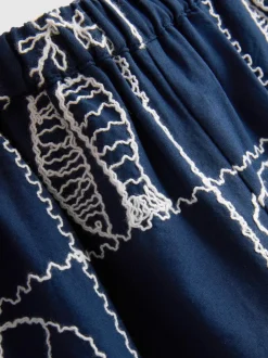 7-15 años | Pantalones bordados