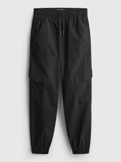 7-15 años | Pantalones cargo con bajos ajustados