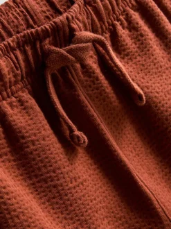1-9 años | Polo y pantalones cortos con textura