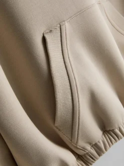 7-15 años | Sudadera con capucha y bajo abullonado