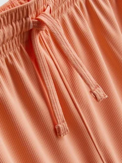 7-15 años | Top y pantalones cortos deportivos