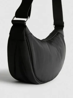 Bandolera acolchada con forma de media luna