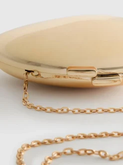 Bandolera ovalada metalizada de Paula Echevarría