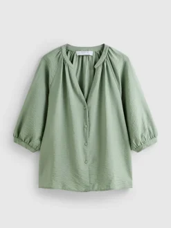 Blusa con cuello de pico y manga 3/4