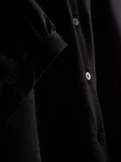 Blusa con cuello de pico y manga 3/4