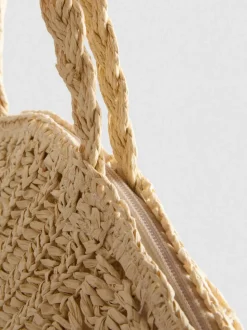 Bolso de hombro tejido en forma de concha
