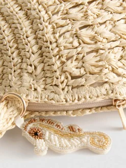 Bolso de hombro tejido en forma de concha