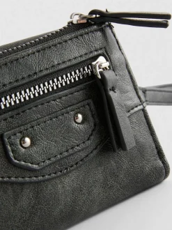 Bolso de mano con cremallera integral y muñequera