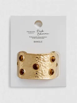 Brazalete con detalle de cuentas de Paula Echevarría