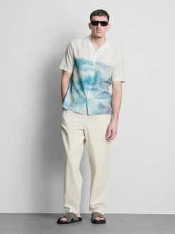 Camisa con estampado de paisaje y cuello con solapas