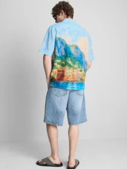 Camisa con estampado de paisaje y cuello con solapas