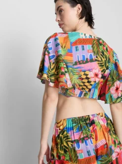Camisa corta con estampado tropical y lazo