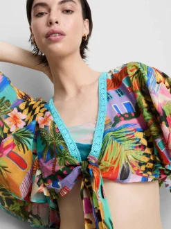 Camisa corta con estampado tropical y lazo