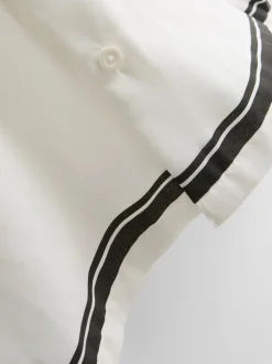 Camisa tipo resort con estampado de palmeras