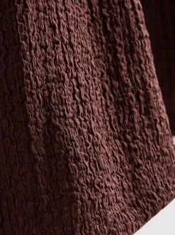 Camiseta asimétrica con textura