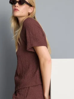 Camiseta asimétrica con textura