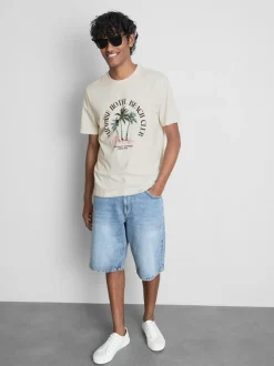 Camiseta con estampado gráfico «Paradise Beach»