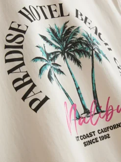 Camiseta con estampado gráfico «Paradise Beach»