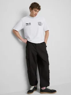 Camiseta con estampado gráfico «Archive Studio»