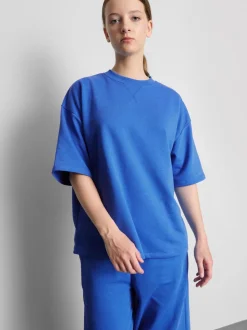 Camiseta con hombros caídos para el aeropuerto