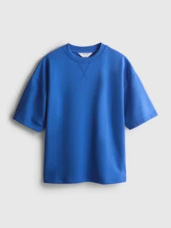 Camiseta con hombros caídos para el aeropuerto
