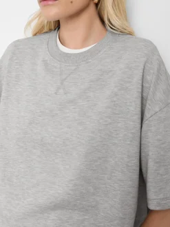 Camiseta con hombros caídos para el aeropuerto