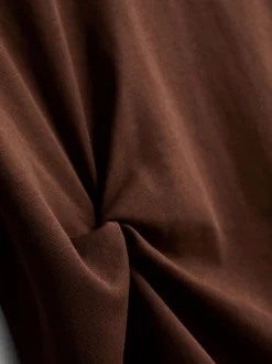 Camiseta de algodón con detalle retorcido