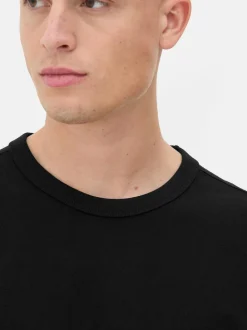 Camiseta de algodón holgada con cuello redondeado