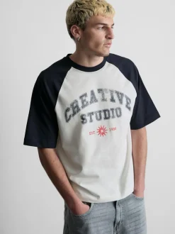 Camiseta de manga raglán «Creative Studio»