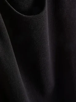 Camiseta larga de punto sin mangas