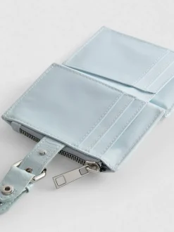 Cartera con cremallera y textura