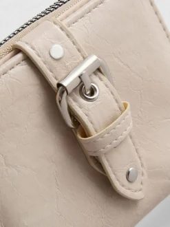 Cartera con cremallera y textura