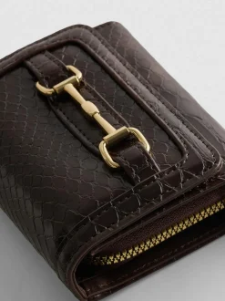 Cartera con detalle de bocado de caballo