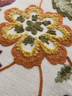 Cojín de apoyo floral bordado