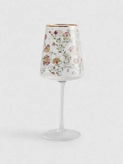 Copa de vino con tallo, pie y flores