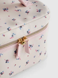 Estuche tocador de piel sintética con diseño floral