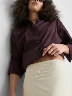 Falda midi asimétrica con cuentas