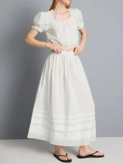 Falda midi de algodón con bordados