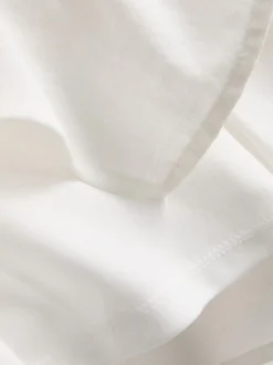Falda pantalón corta en mezcla de lino con lazada