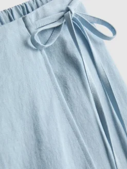 Falda pantalón corta en mezcla de lino con lazada