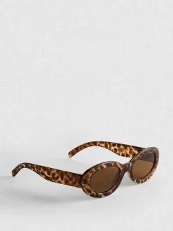 Gafas de sol ovaladas con estampado animal