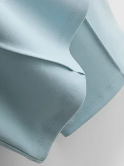 Joggers acampanados con alforzas y algodón