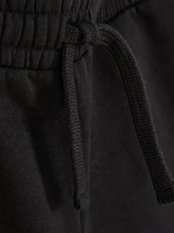 Joggers básicos con bajos ajustados