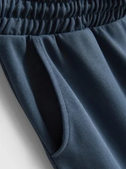 Joggers de pernera ancha con algodón