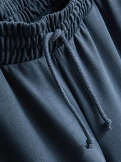 Joggers de pernera ancha con algodón
